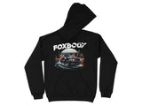 Black hoodie with "FOXBODY" text and a car driving through a city at sunset graphic.