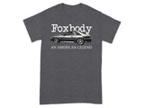 Dark gray t-shirt with "Foxbody An American Legend" and a Ford Mustang illustration.
