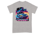 Gray t-shirt with retro graphic of a blue car and colorful abstract background with "FOXBODY" text.