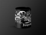 Black mug with white line art of a classic Impala car in a city setting.