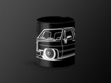 Black mug with a white outline illustration of a lowered classic pickup truck.