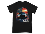 Black t-shirt with graphic of a lowrider truck under an American flag sun.
