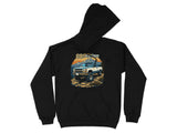 Black hoodie with "OBSession" text and vintage truck in mountain landscape graphic.