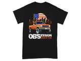 Orange lifted truck with American flag and city skyline. OBSESSION POWERSTROKE SINGLE CAB.