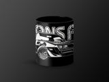 Black mug with white graphic of classic muscle car and text "TRANS AM".