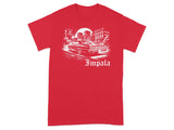 Red t-shirt with white graphic of a vintage car and city skyline, text reads "Impala".